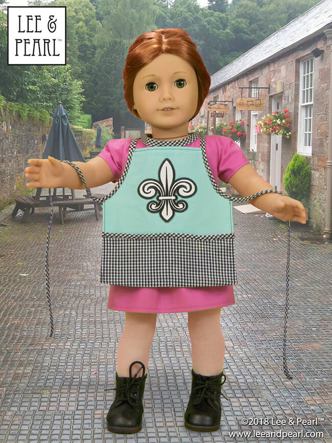 Who else is mesmerized by the Great British Baking Show this Christmas? Today, we're presenting baking-themed patterns for dolls, perfect for gifts, holiday scenes, sewing along to your favorite new TV show — and for Blaire Wilson, the COMING SOON 2019 American Girl Girl of the Year! Here’s Pattern 1033: Bonjour, Paris Top, Dress, Shorts and Chef’s Apron for 18 Inch Dolls, available in the Lee & Pearl Etsy store at https://www.etsy.com/listing/267357348/lp-1033-bonjour-paris-wardrobe-pattern