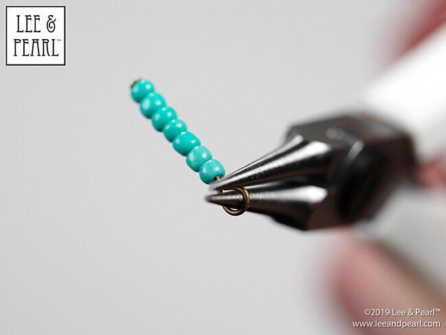 With the techniques and tools we feature in the Lee & Pearl Introduction to Jewelry Making for Vinyl Play Dolls eBook, when you see a style that you like, you can recreate it yourself. Follow along as we show you how we turned a Pinterest inspiration image into this turquoise sunburst choker for 18 inch American Girl® and other dolls!