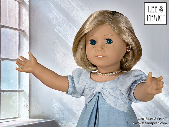 FREE PATTERN! Subscribe to the Lee & Pearl mailing list and we'll send you Pattern 1038: The Gift Bow Front Dress for 18 inch American Girl, 16 inch A Girl for All Time and 14 1/2 inch Wellie Wisher and similar dolls as our FREE gift. Make this lovely, festive dress from quarter yards or fat quarters of a wide range of fabrics -- quilting cottons to silks. This pattern won't remain FREE forever. Don't miss out, join our mailing list today at www.leeandpearl.com.