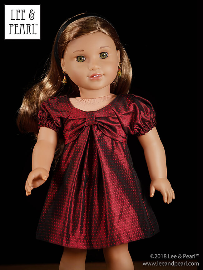 FREE PATTERN! Subscribe to the Lee & Pearl mailing list and we'll send you Pattern 1038: The Gift Bow Front Dress for 18 inch American Girl, 16 inch A Girl for All Time and 14 1/2 inch Wellie Wisher and similar dolls as our FREE gift. Make this lovely, festive dress from quarter yards or fat quarters of a wide range of fabrics -- quilting cottons to silks. This pattern won't remain FREE forever. Don't miss out, join our mailing list today at www.leeandpearl.com.
