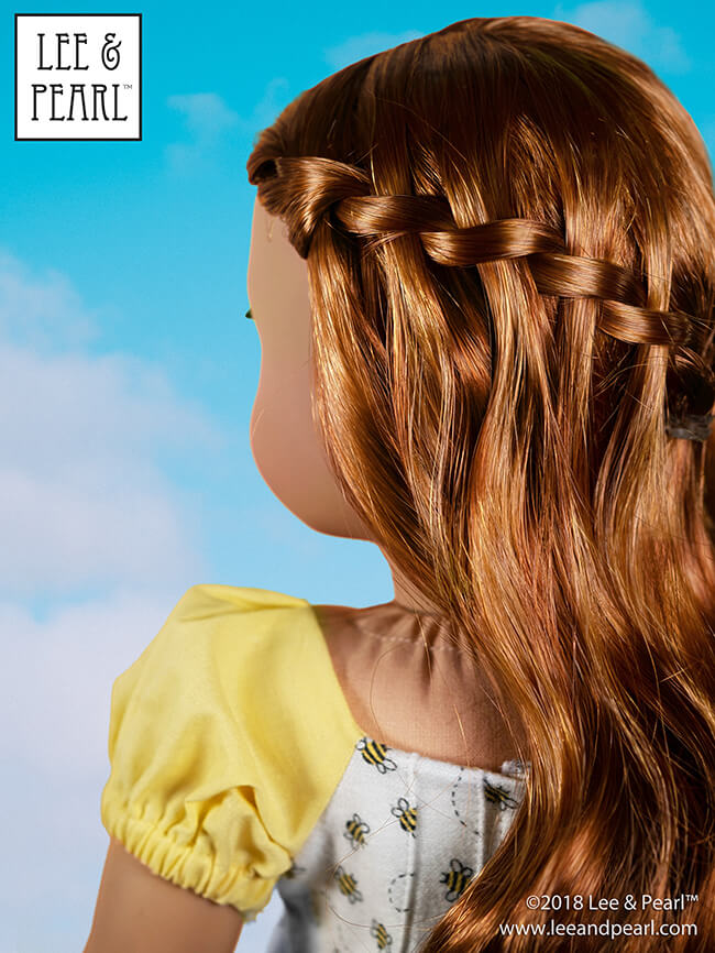 Join Lee & Pearl as we welcome American Girl® Girl of the Year™ Blaire Wilson! We made this Blaire-appropriate dress using color-coordinated cotton fabric from JOANN and Pattern 1038: The Gift Bow Front Dress for Dolls, our current FREE PATTERN for newsletter subscribers. We even created the waterfall braid on our doll to match Blaire’s braid — CLICK THROUGH to find out how!