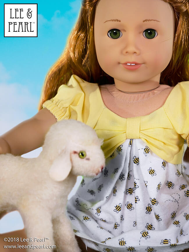 Join Lee & Pearl as we welcome American Girl® Girl of the Year™ Blaire Wilson! We made this Blaire-appropriate dress using color-coordinated cotton fabric from JOANN and Pattern 1038: The Gift Bow Front Dress for Dolls, our current FREE PATTERN for newsletter subscribers. Don’t miss out on this lovely pattern — join the mailing list on our website at www.leeandpearl.com