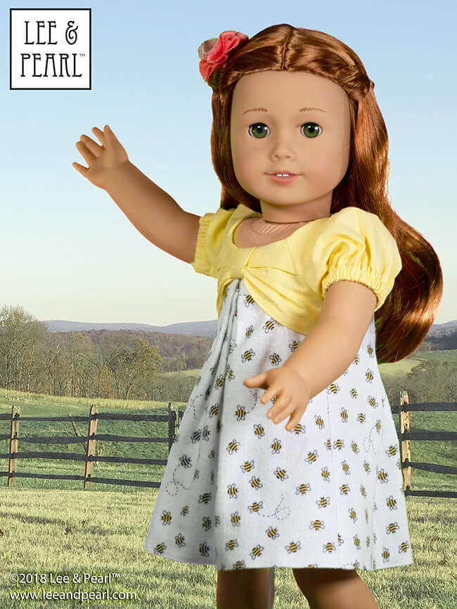 Lee & Pearl are thrilled to welcome American Girl® Girl of the Year™ Blaire Wilson! We made this Blaire-appropriate outfit using Pattern 1038: The Gift Bow Front Dress for Dolls and Pattern 2064: Posh Accessories Hat, Gloves, Fabric Flower and Jewelry for Dolls. Pattern 1038 is our current FREE PATTERN for newsletter subscribers. DON’T MISS OUT — join the mailing list today at www.leeandpearl.com