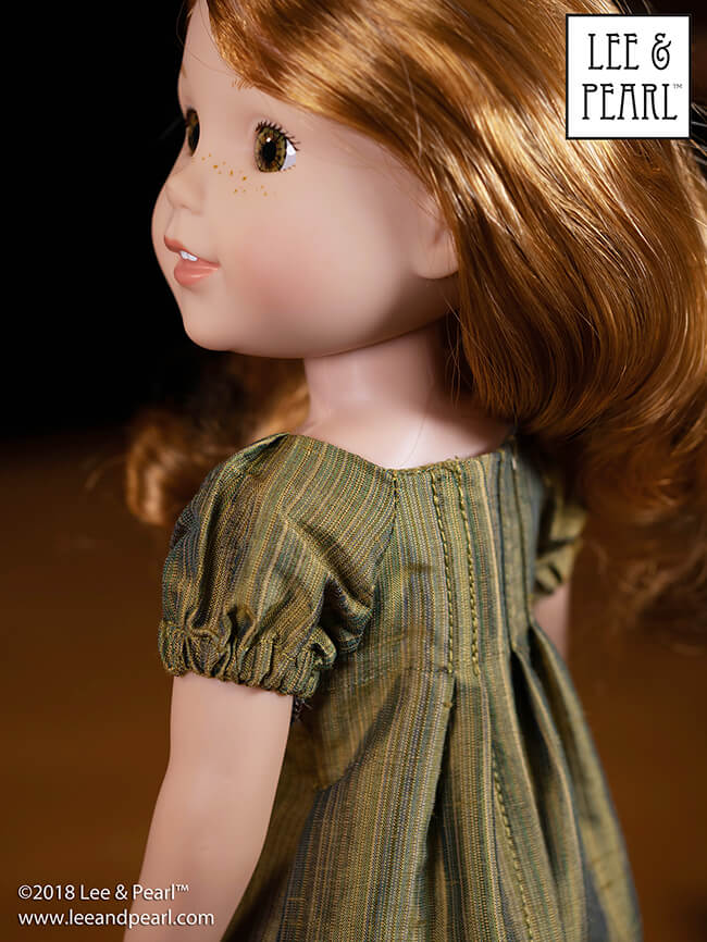 FREE PATTERN! Subscribe to the Lee & Pearl mailing list and we'll send you Pattern 1038: The Gift Bow Front Dress for 18 inch American Girl, 16 inch A Girl for All Time and 14 1/2 inch Wellie Wisher and similar dolls as our FREE gift. Make this lovely, festive dress from quarter yards or fat quarters of a wide range of fabrics -- quilting cottons to silks. This pattern won't remain FREE forever. Don't miss out, join our mailing list today at www.leeandpearl.com.