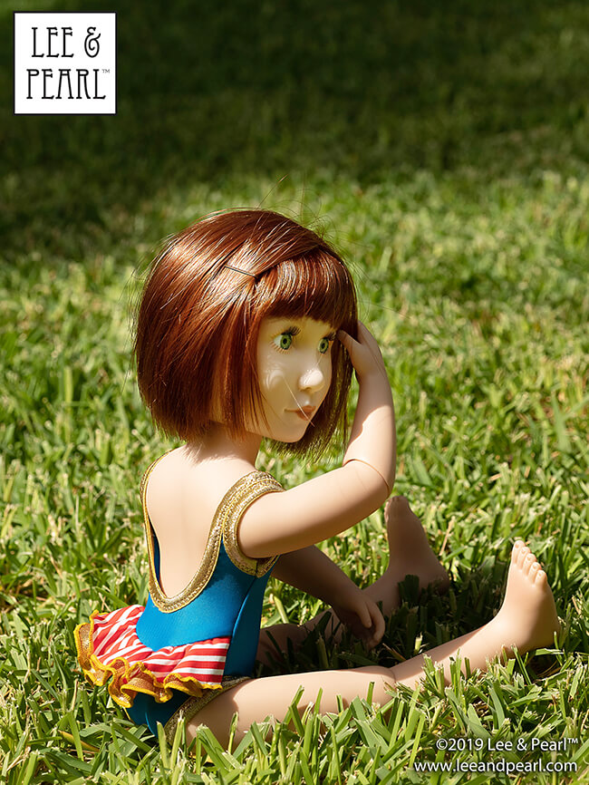 Who else is waiting for the fireworks to start? Our A Girl for All Timel® doll Clementine is wearing a ruffly red-white-and-blue swimsuit that we made using Lee & Pearl Pattern 1058: Retro Ruffled Swimsuit and High Waisted Bikini for Dolls. Find this pattern in the Lee & Pearl Etsy store for 18 inch American Girl, 16 inch AGFAT and 14 1/2 inch WellieWishers dolls.