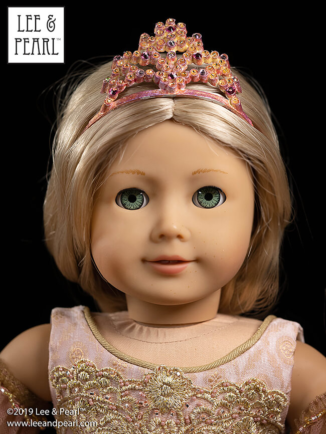 It's Nutcracker season in the Lee & Pearl workshop! While designing our Mix-and-Match Ballet Costume Accessories pattern, Pearl realized that she could take our just-like-the-real thing Sugar Plum Fairy tutu ensemble to an even more gorgeously glittering level with a matching TUTU PLATE, dainty tulle SLEEVE PUFFS, and a sparkling painted plastic TIARA. This may be our favorite 18 inch / American Girl doll costume of all time, and we're going to show you all the lovely details that went into making it!