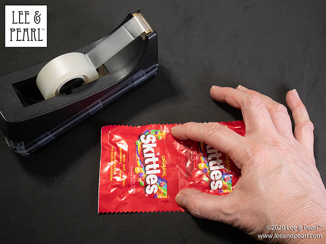 Happy Halloween from Lee & Pearl! We’ve got a YUMMY tutorial for you and your dolls today. Follow along as we show you how to make wonderfully realistic 18 inch doll-size replicas of popular fun-size bagged candies. Skittles and M&Ms are our favorites. What are yours?