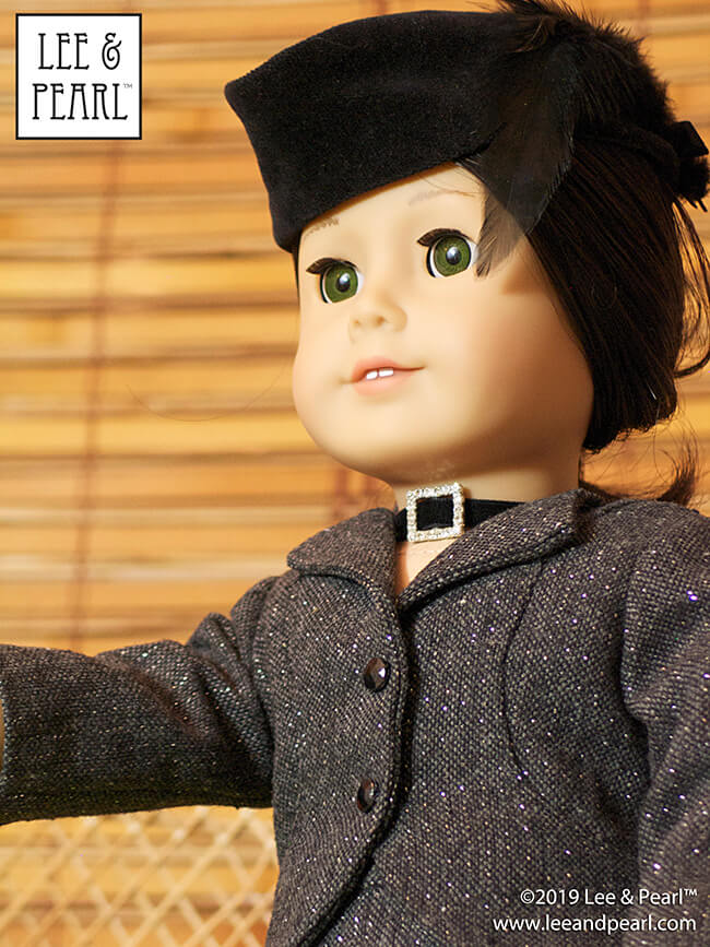 Bang! Our American Girl doll makes a stunning 40s film noir femme fatale in her glittery Lee & Pearl Pattern 1943: Molly Waves Goodbye suit and feather trimmed, black velvet Pattern 2021: Glengarry Hat for 18 Inch Dolls.