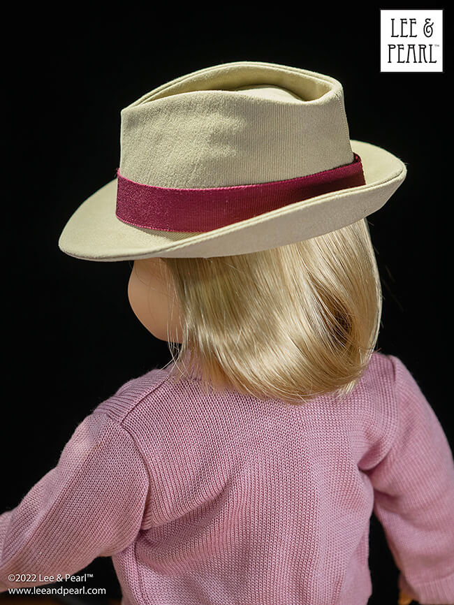 Introducing our new FREE pattern for mailing list subscribers — Lee & Pearl Pattern 2023: The Fedora Hat for 18", 16" and 14 1/2" Dolls. For this pattern, our designer reimagined iconic molded hat elements as flat pattern shapes and seams. 

That's right — this is an entirely SEWN hat. And it's sized to fit all three of our favorite dolls: American Girl, A Girl for All Time and WellieWishers and similar dolls.

Join the Lee & Pearl mailing list at www.leeandpearl.com and get this pattern as our exclusive FREE gift!