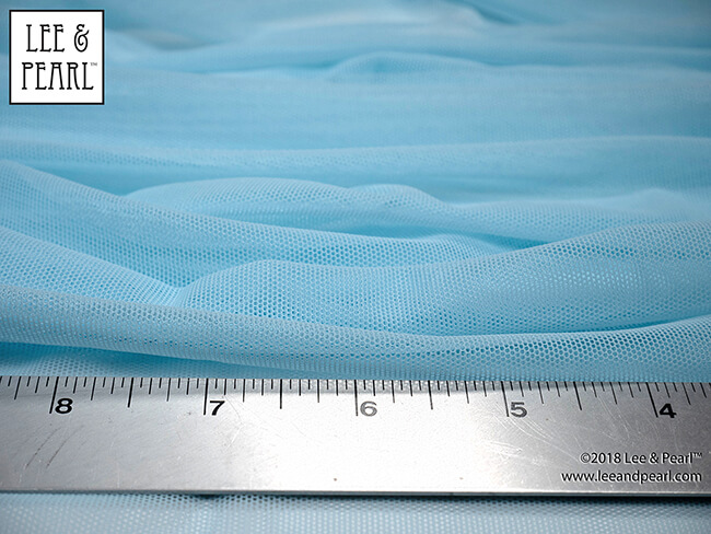 HALF PRICE WHILE SUPPLIES LAST — SKY BLUE stretch mesh in the Lee & Pearl Etsy shop. This is a gorgeous fabric — the same sturdy 82/18 mesh as our skin tone meshes, but in a really pretty, flattering clear blue. It's perfect for skating and ice dancing dresses, gymnastic leotards, dance outfits, strapless gowns, pageant dress inserts, cosplay and costumes for dolls — or humans!