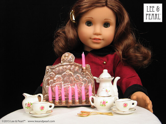 Happy Chanukah from Lee & Pearl! Make your dolls their own circa 1900 traditional Chanukah Menorah (Chanukiya) using a dollar store baking sheet, some plastic beads — and our downloadable template, video tutorial and detailed newsletter directions.