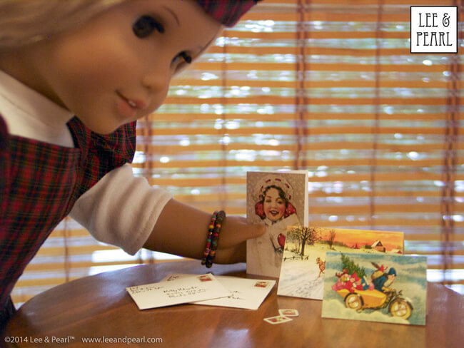Get these FREE printable vintage Christmas cards, envelopes and stamps for 18" dolls like our American Girl Julie at www.leeandpearl.com/free.html