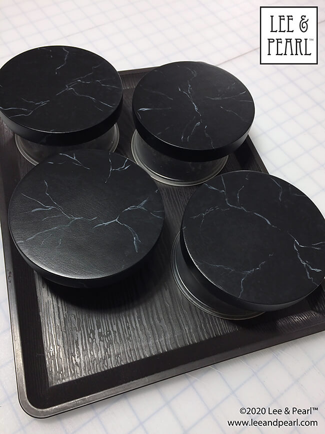 Here's a fun Halloween tutorial — follow our step-by-step directions to paint your own faux soapstone tabletop for dolls, just like the one we made for the Lee & Pearl Mad Scientist Laboratory extravaganza!