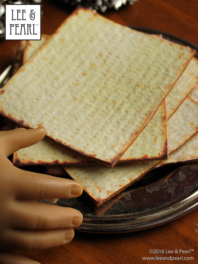 Chag Pesach Sameach and Shabbat Shalom! Our American Girl Doll loves her new silver Sabbath candlesticks and the amazingly realistic Passover matzos we made with our Candlestick Tutorial and FREE Matzo Iron-On Printable. Find the tutorial and printable in the Lee & Pearl April 2016 Newsletter at http://leeandpearl.com/2016_04_newsletter.html#passover
