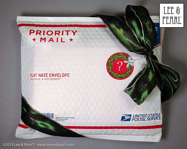 Treat yourself to a surprise fabric gift this holiday season! We're calling our 2020 Lee & Pearl Mystery Bags the SILKEN LUXURY HOLIDAY edition because each bag will contain TWO half yard pieces of shimmering 100% silk dupioni or shantung taffeta, along with materials chosen from our velvets, velveteen, lamé, crinkle rayon, sateen, brocade, faux leather, sequin-studded jersey and anything else we can find that sparkles, rustles, shimmers or shines. Don't wait — once this edition is SOLD OUT, you'll have to wait for the next sale in 2021.