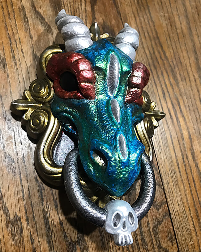 Join us for Lunch with Lee and Pearl LIVE on Facebook every Monday, Wednesday and Friday at 2pm Eastern, 1pm Central, 12pm Mountain and 11am Pacific. TODAY, we’ve got a spooktacular craft demonstration as Lee finishes turning an inexpensive plastic dragon door knocker from Target into a gloriously painted fantasy dragon head faux taxidermy — perfect for all your Halloween castle walls and wizard's towers!